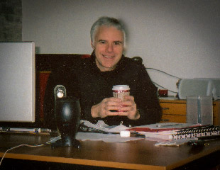 At his desk at work.